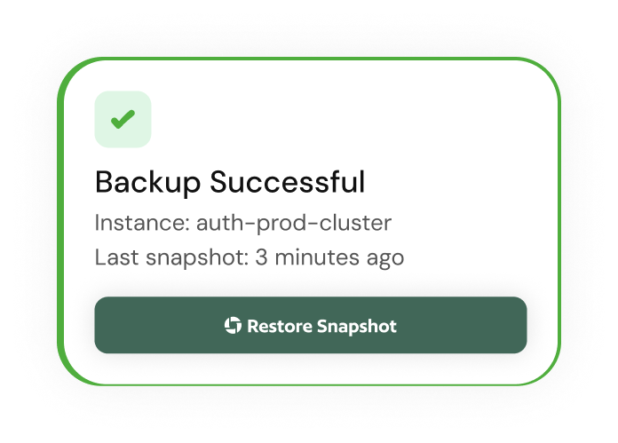 Backup successful notification card for auth-prod-cluster with a restore snapshot button.